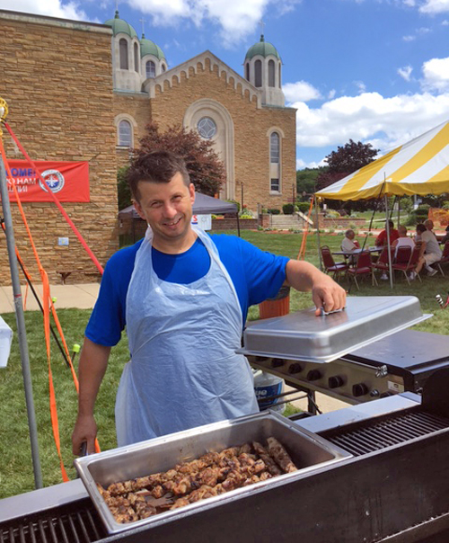 Grilling cevapi at Serbian Festival