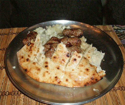 Ćevapi in somun, with onion,