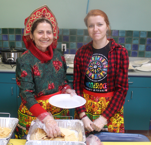 Preparing Blini (crepes) at Russian Maslenitsa