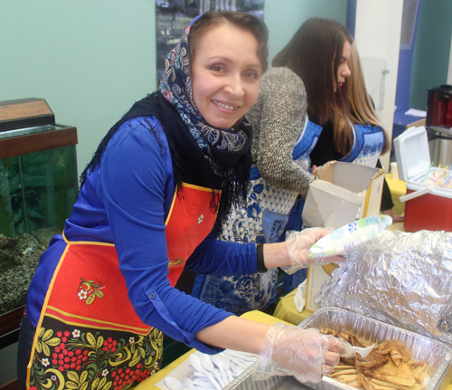 Preparing Blini (crepes) at Russian Maslenitsa